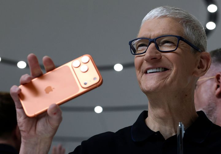 As Tim Cook Steps Down, Apple Hit Record Sales — But A Chip Shortage Looms 1 tim cook iphone GettyImages 2234563479