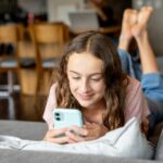 tween girl on phone GettyImages 2231040634