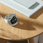 Google Pixel Watch 5 on display with health monitoring features shown on screen