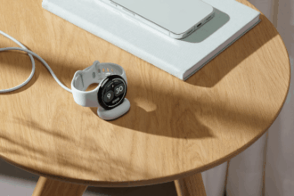 Google Pixel Watch 5 on display with health monitoring features shown on screen