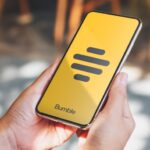 Bumble app logo displayed on a smartphone screen showing the Plans feature interface