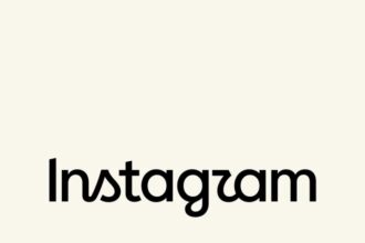 Instagram's new wordmark logo displayed on a smartphone screen